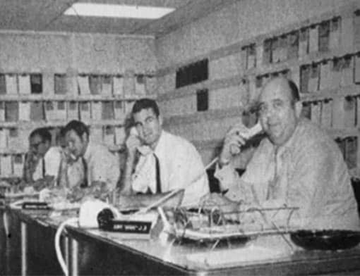 Black and white historical photo of Melton Truck Lines employees