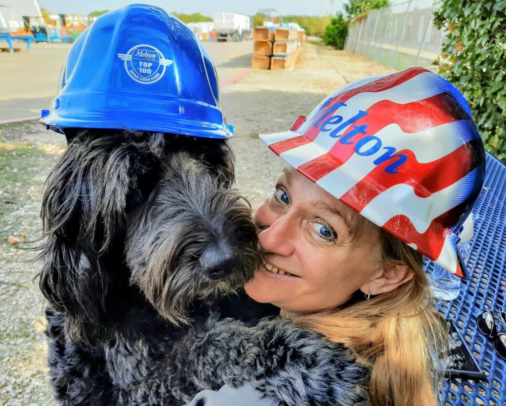 Melton Flatbed Driver's Wife and dog wearing Melton safety hats