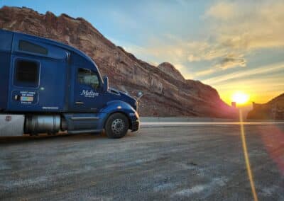 Driver stopped in Utah during a sunset during a layover