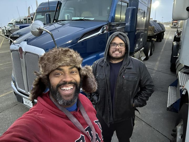 A Melton road trainer taking a selfie with a new truck driver.