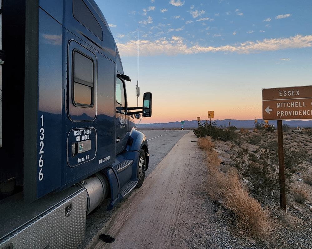 Melton truck driving into the sunset