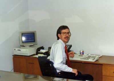 Melton employee sitting at a desk