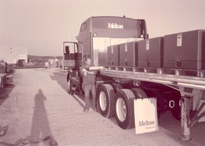 Black and white photo of a Melton truck