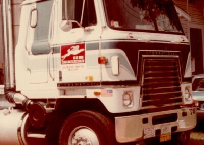Old photo of a Melton truck with the running rabbit logo.