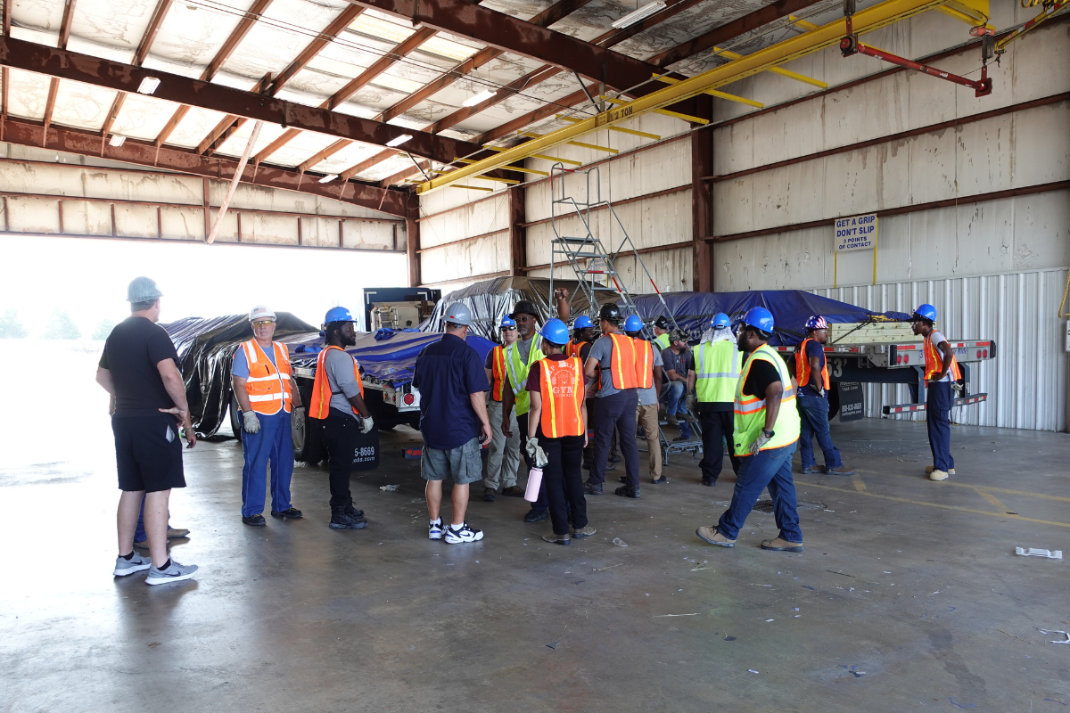 A group of students learning about load securement at Melton