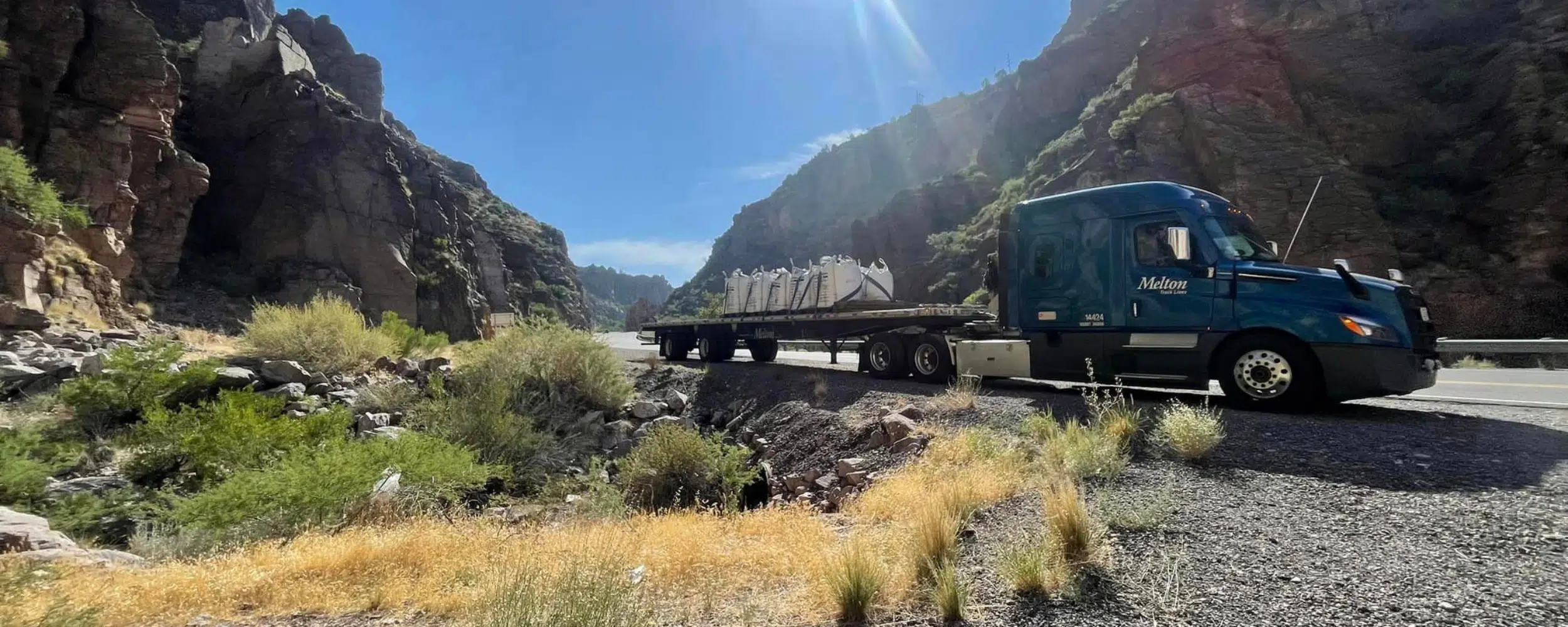 Melton truck driving through canyons
