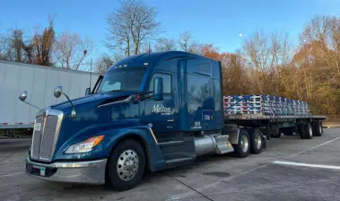 Melton truck with leaves in the background