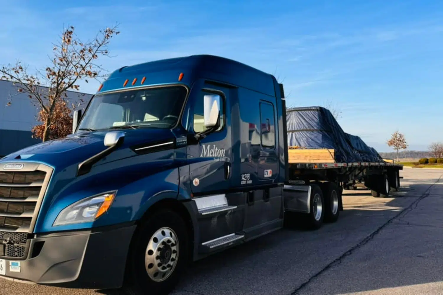 A Melton truck with a secured load