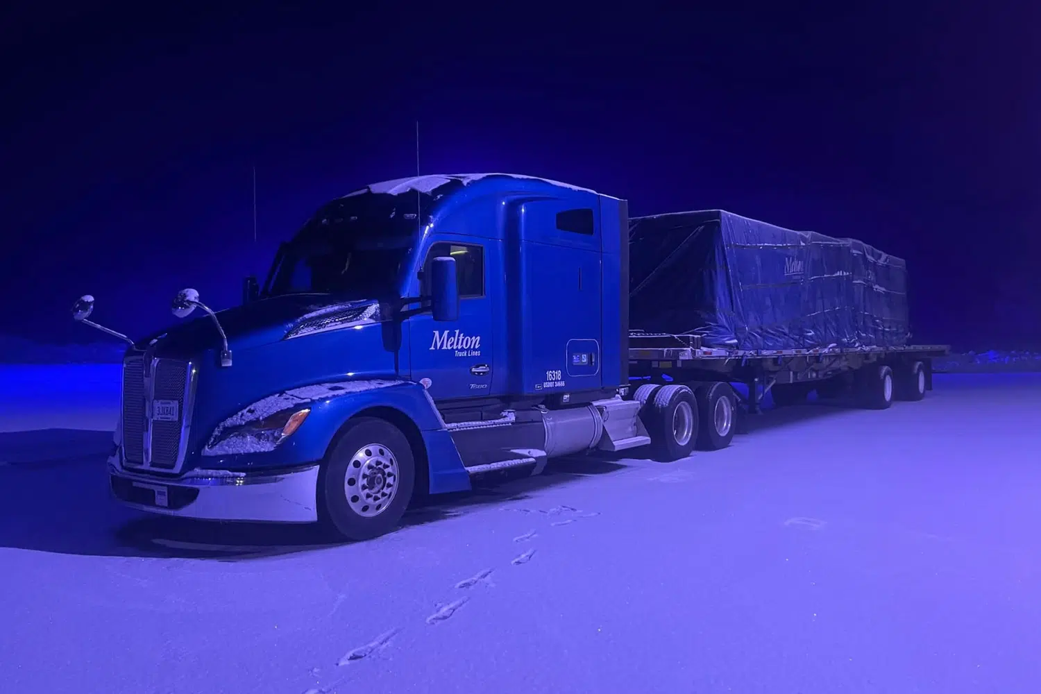 Melton truck parked in the snow