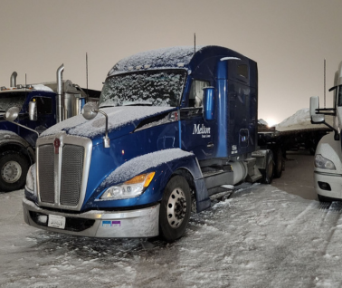 A Melton truck parked in the snow in Canada